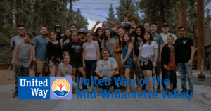 United Way of the Mid Willamette Valley logo on top of a photo of youth smiling in the forest